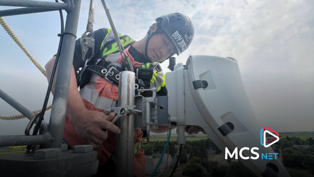 Picture of an MCSnet tower climber installing GigAir equipment.