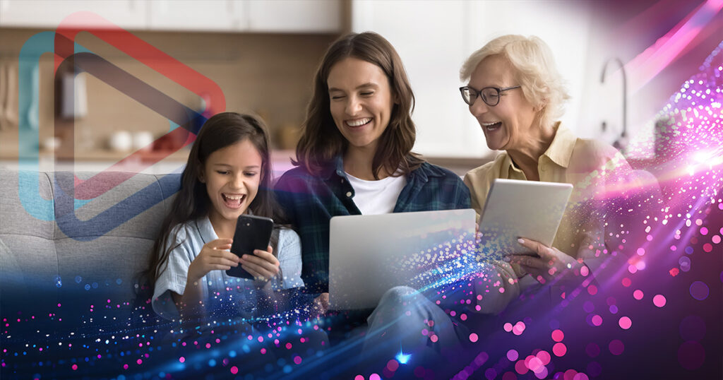 Image of three generations of women using mobile phone, laptop, and tablet for high speed internet.