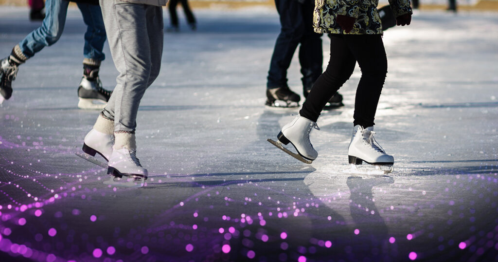 Image of people skating on a rink. 