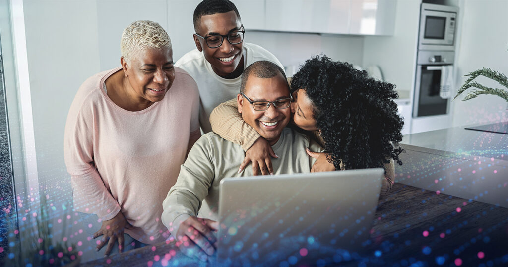 Extended family connected with other family members over a video chat.