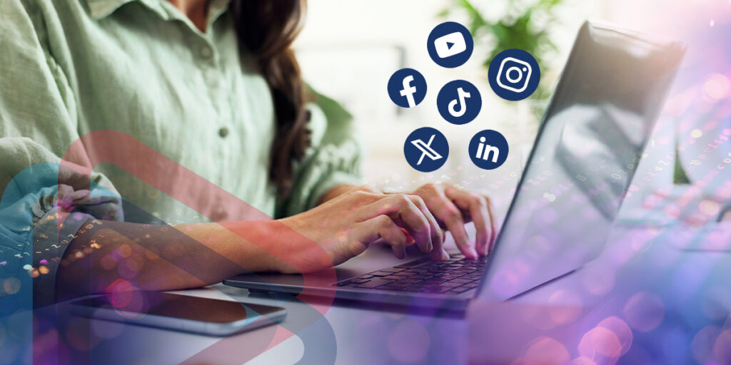 A woman typing on a laptop with social media channel icons floating above. 