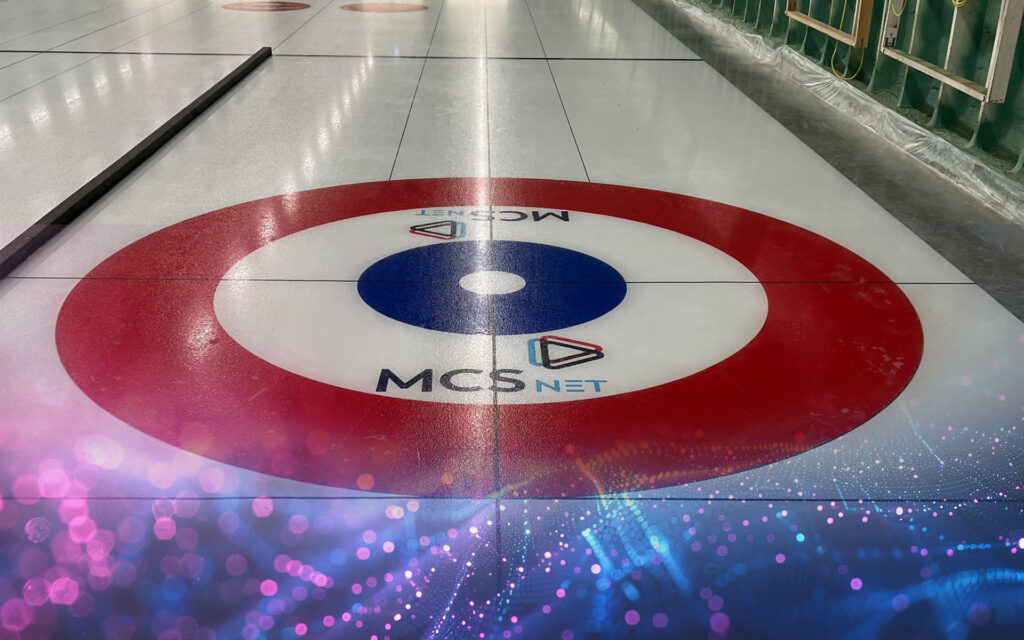 A photo of the MCSnet logo within one of the houses at the Elk Point Curling Rink.