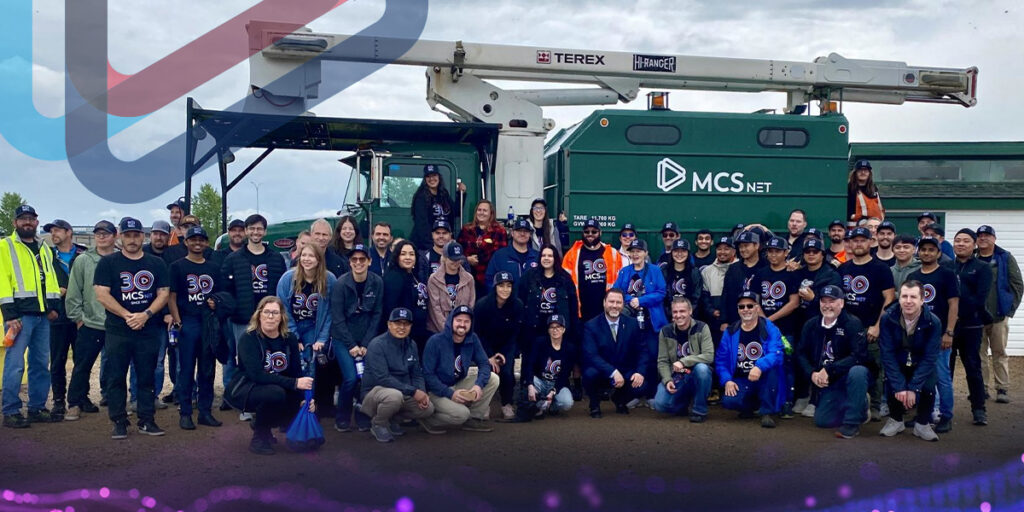 Picture of the MCSnet staff, contractors, and invited guests at the 30th anniversary celebration.