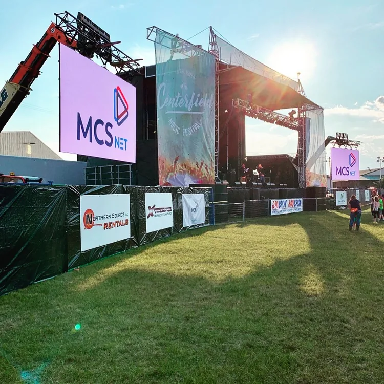 Picture of MCSnet's logo beside the Centrefield Music Festival stage in 2019.