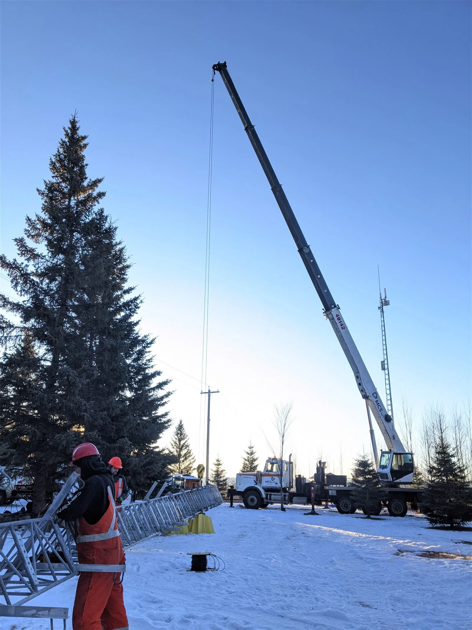 MCSnet crew building a wireless tower near Fort Assiniboine, Alberta