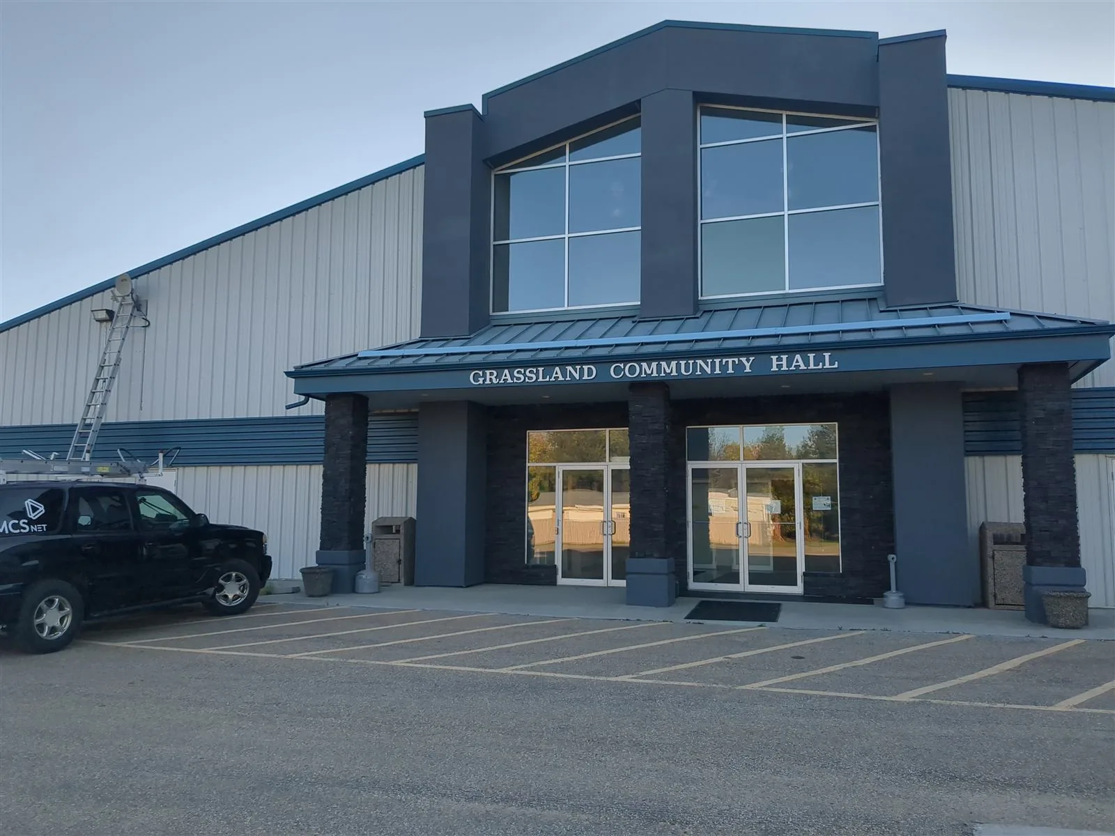 MCSnet service truck outside the Grassland Community Hall, Alberta