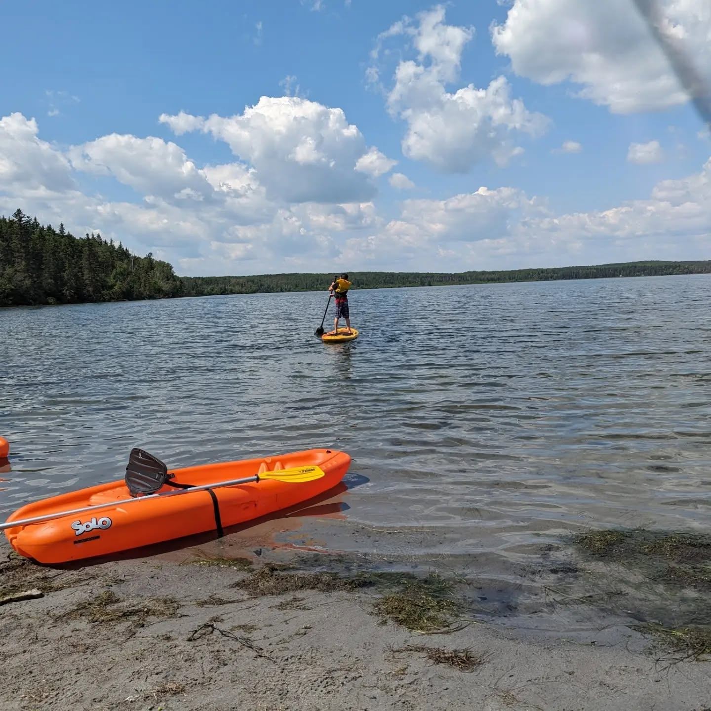 Paddleboarding and kayaking on Muriel Lake, Alberta
