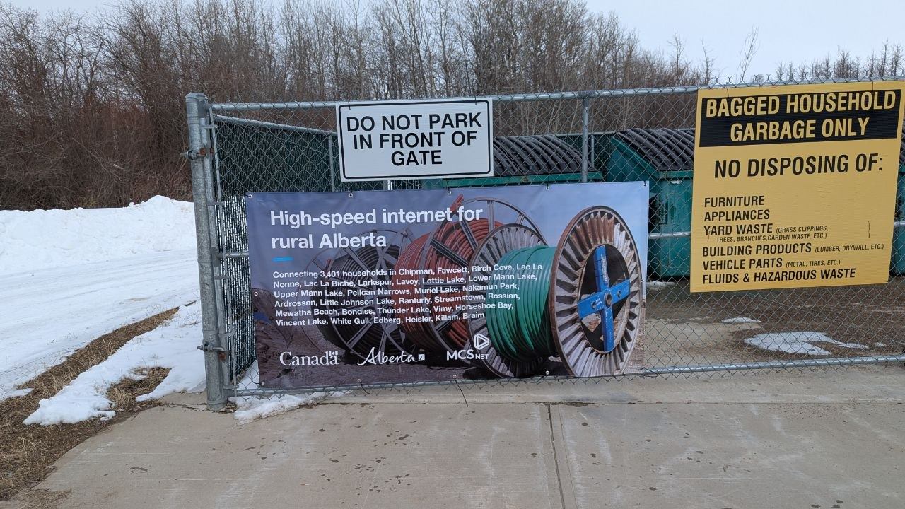 MCSnet high-speed internet banner listing fiber communities including Lower Mann Lake and Upper Mann Lake