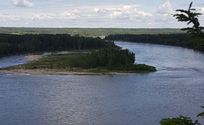 Aerial view of the forested Lakeland terrain around Thunder Lake, Alberta