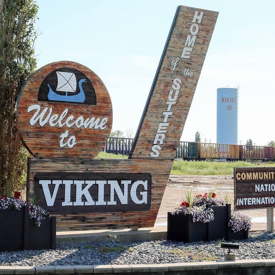 Welcome to Viking sign reading Home of the Sutters, with the Viking water tower in the background